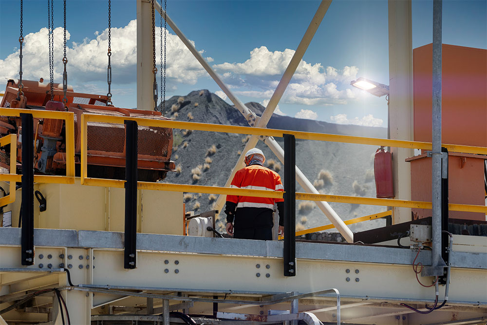 exploitation at a diamond mine technician walking in the processing plant